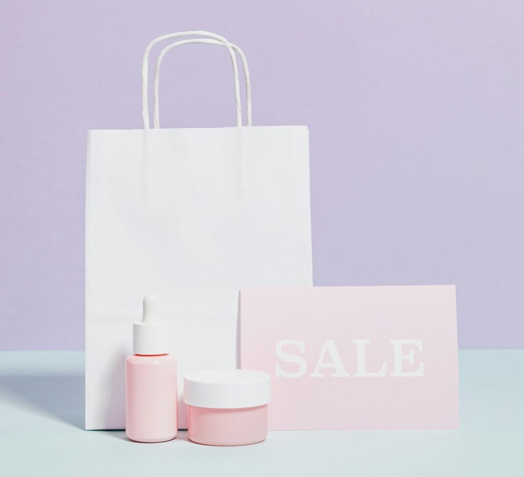 Elegant beauty product display with sale sign and shopping bag in minimalist style.